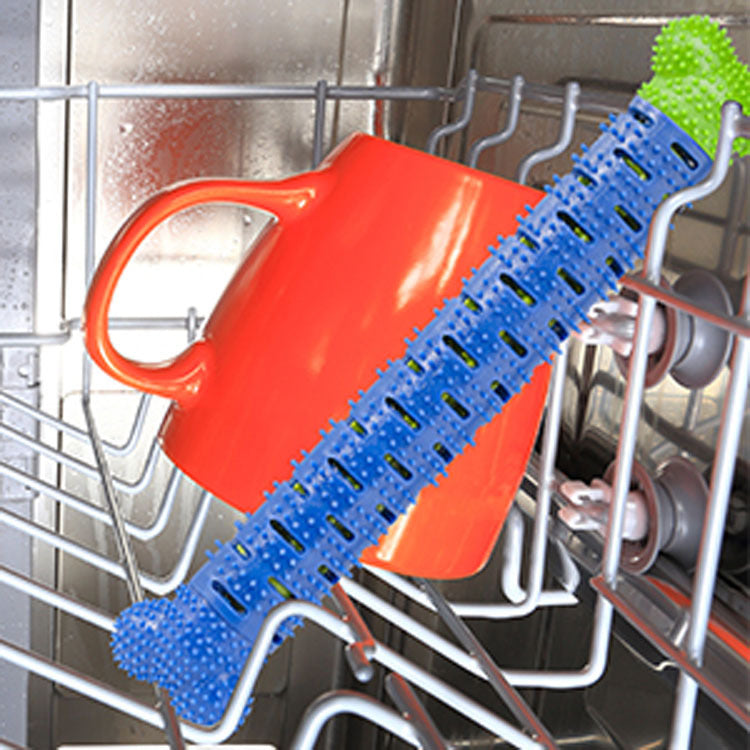 dog chewing tooth brush